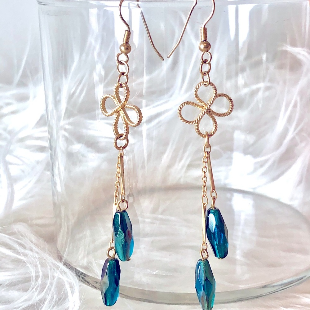 Long dainty gold earrings with blue gems